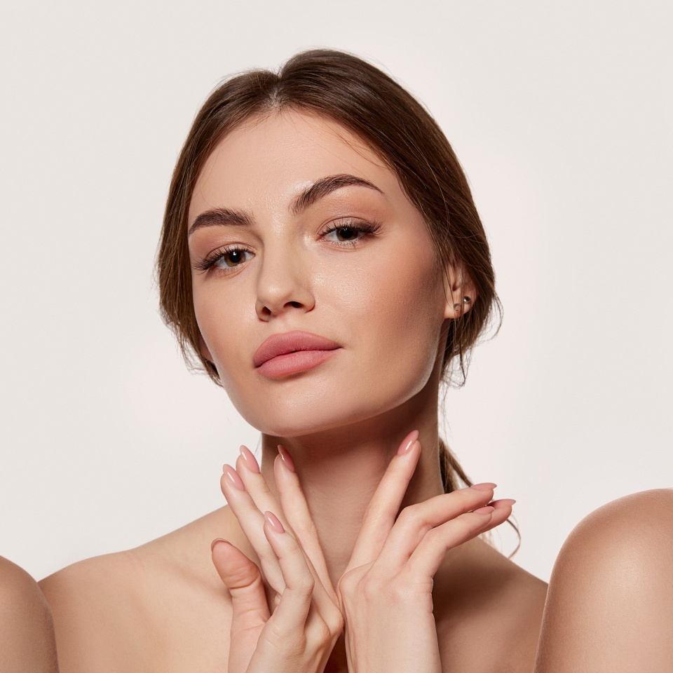 Beautiful, young women with healthy, well-kept skin against grey background. Facebuilding. Aging. Collage. Concept of natural beauty, plastic surgery, cosmetology, cosmetics, skin care